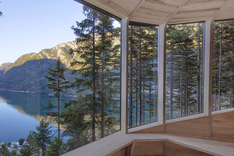 spectacular lake view from glass windows in cabin